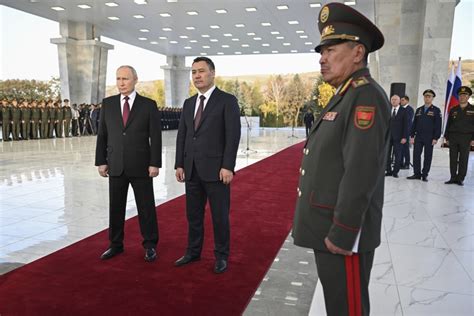 Russian President Putin arrives in Kyrgyzstan on a rare trip abroad